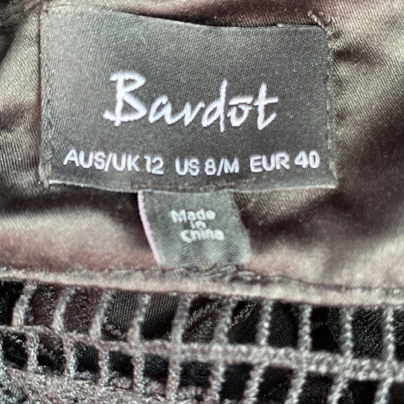 Revolve| Bardot Black Crochet Lace
Gemma Midi Halter Dress - Picture 8 of 8